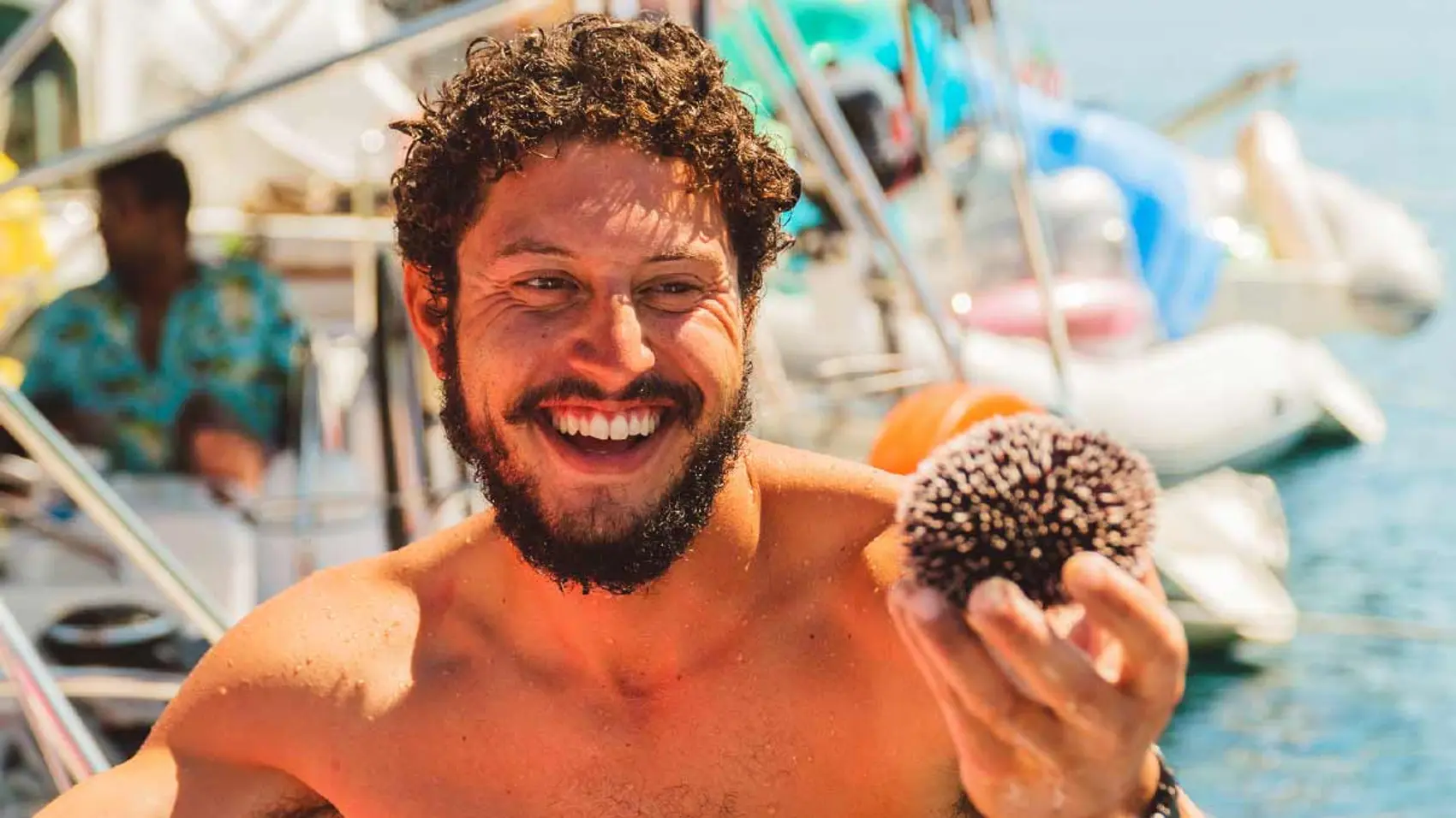 Man holding a sea urchin